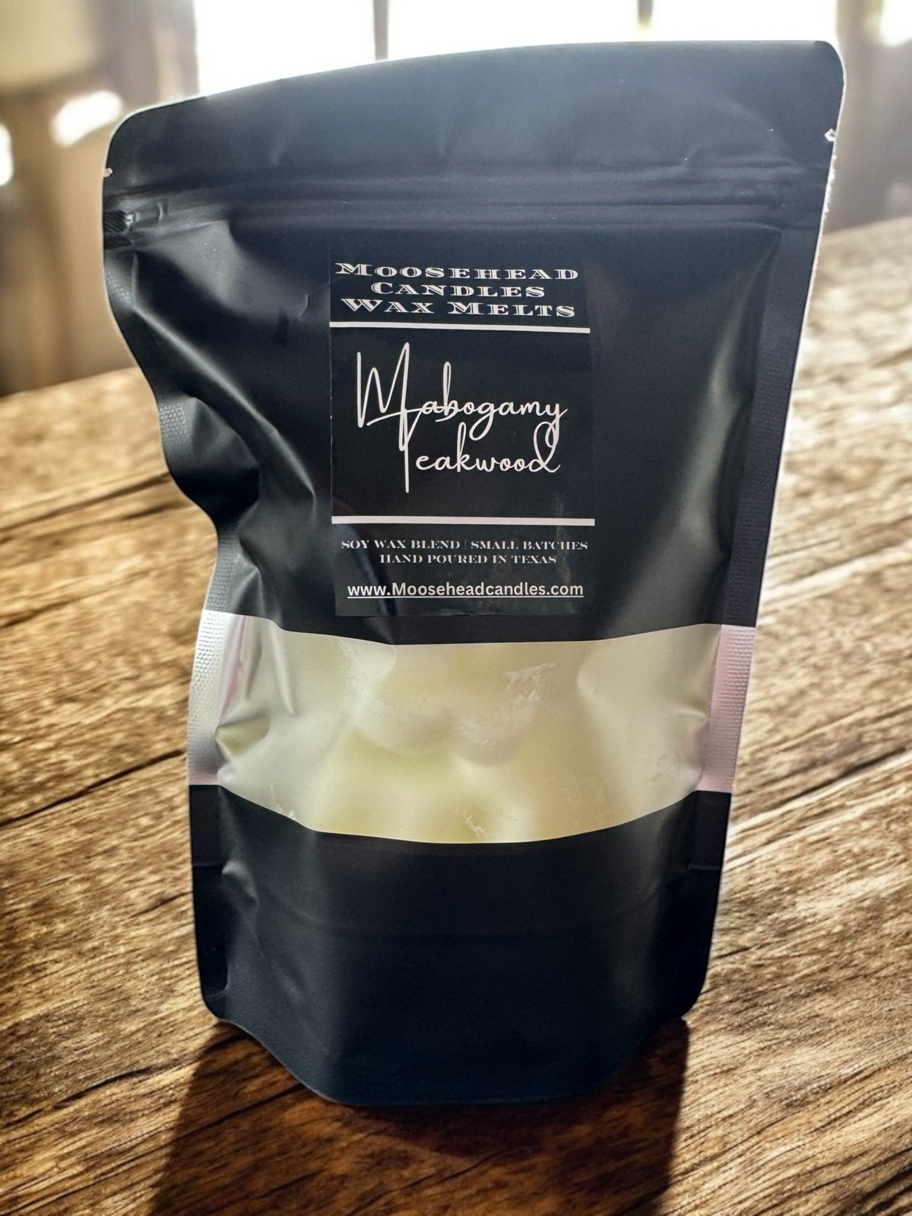 Mahogany teakwood scented wax melts. 8 count bag of 1oz puppy print wax melts| resealable bag 1 melt at a time to smell the whole house