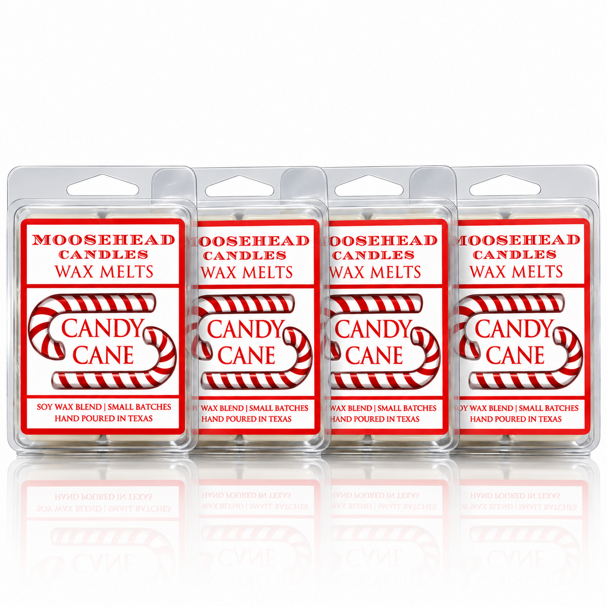 Four Moosehead Candles Candy Cane wax melt packs with red and white labels