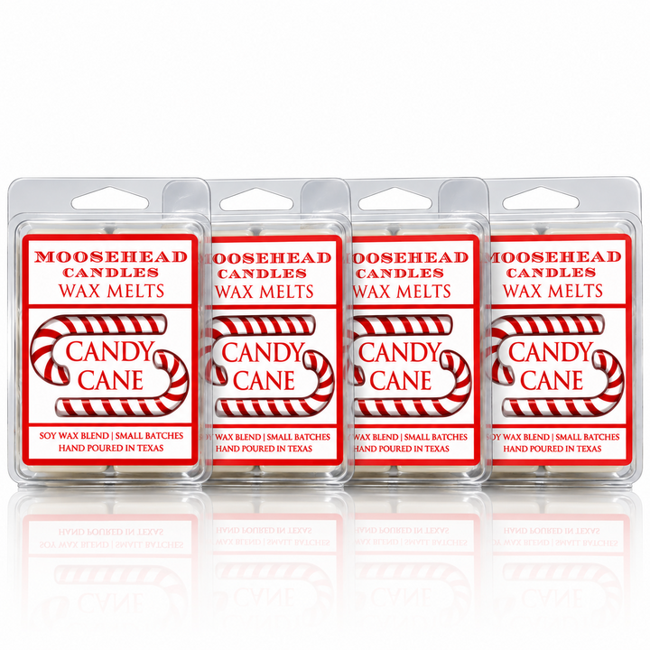 Four Moosehead Candles Candy Cane wax melt packs with red and white labels